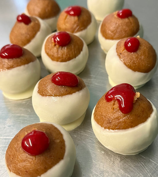 Almond Butter White Chocolate Buckeyes with Raspberry Tart Filling